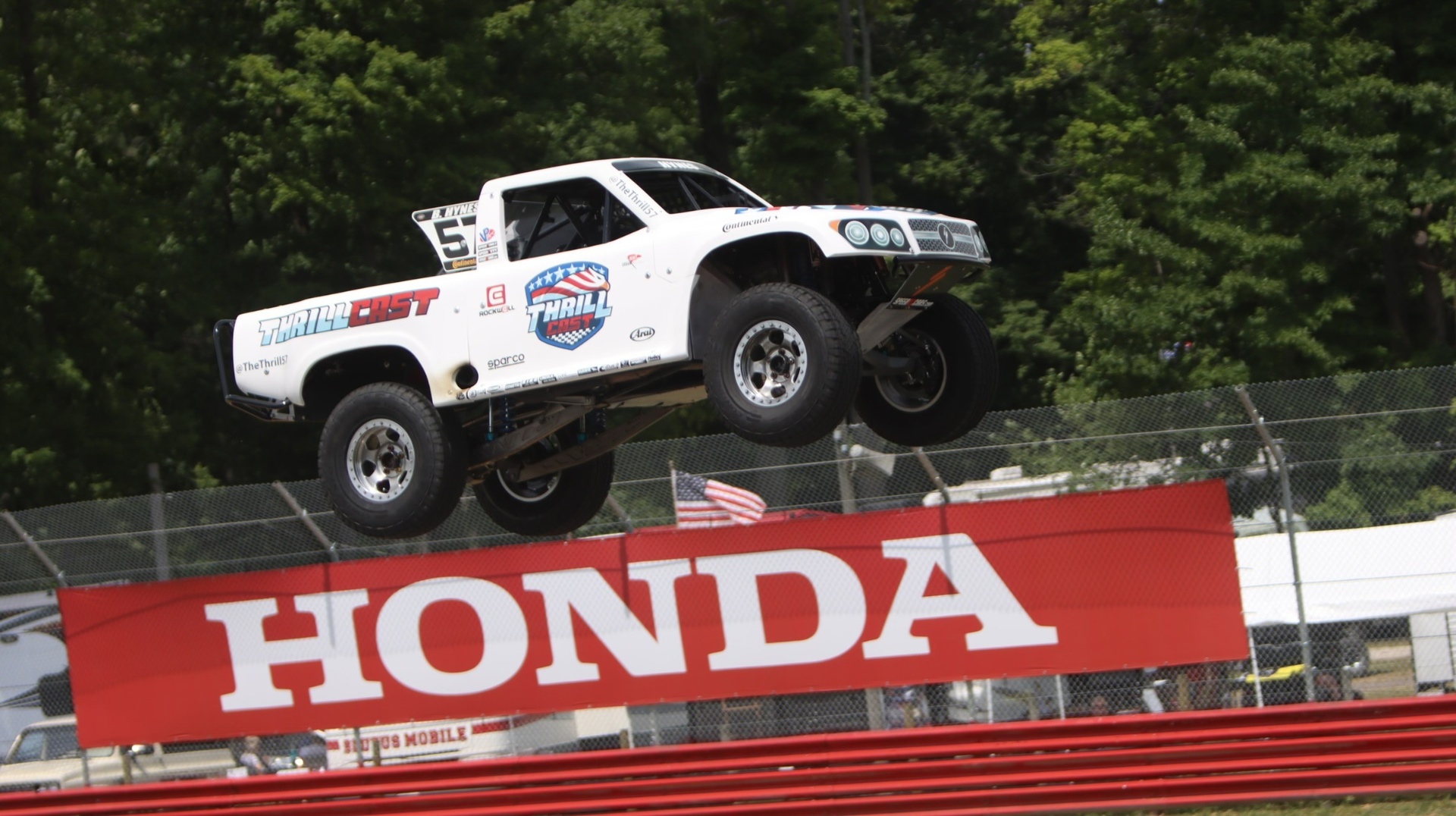 Bill Hynes jumping the #57 Stadium SUPER Truck at Mid-Ohio