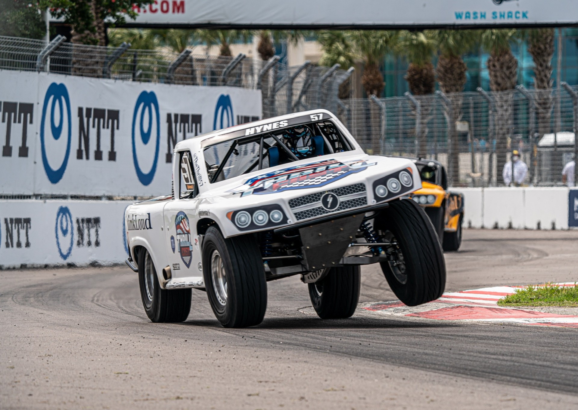 Bill Hynes driving the #57 Stadium SUPER Truck on two wheels at St. Petersburg